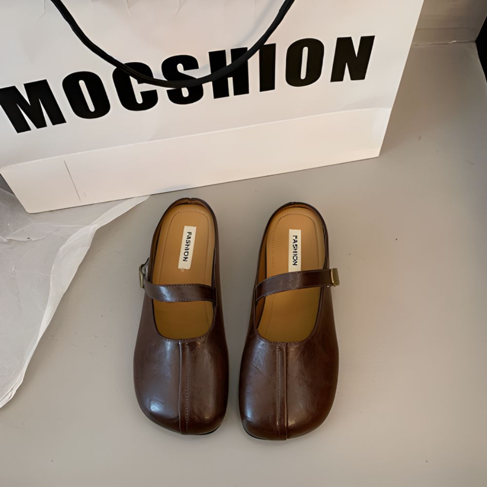 Mules mocassins souples en cuir synthétique