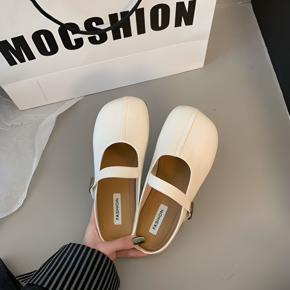 Mules mocassins souples en cuir synthétique