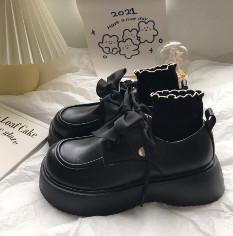 Mocassins à noeud papillon et semelle épaisse