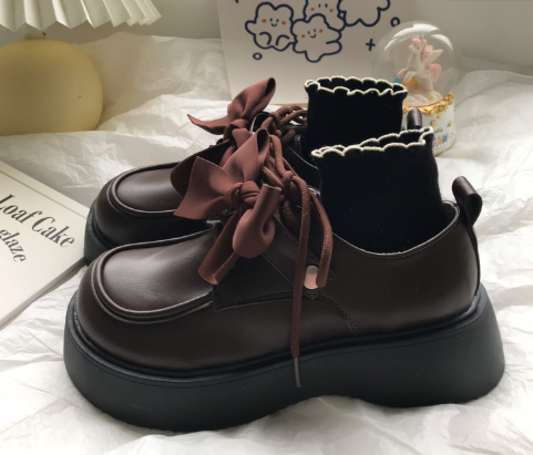 Mocassins à noeud papillon et semelle épaisse