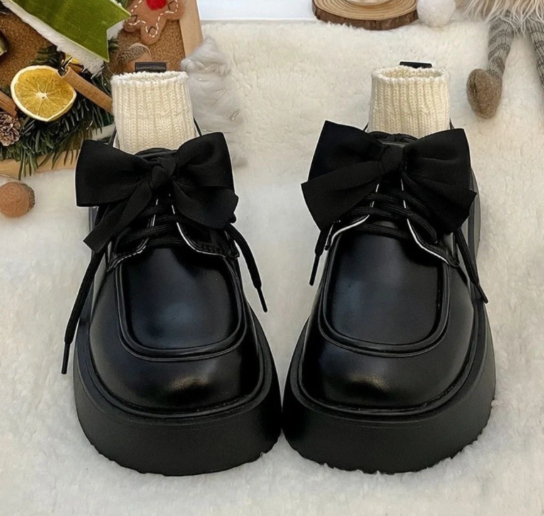Mocassins à noeud papillon et semelle épaisse