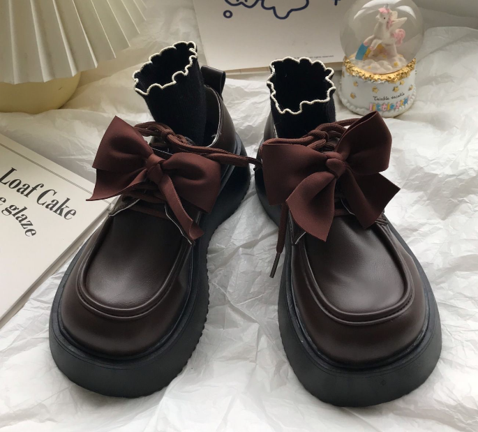 Mocassins à noeud papillon et semelle épaisse