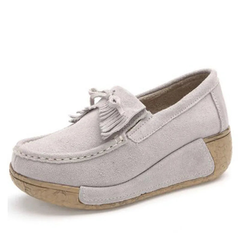 Mocassins compensés à franges en daim