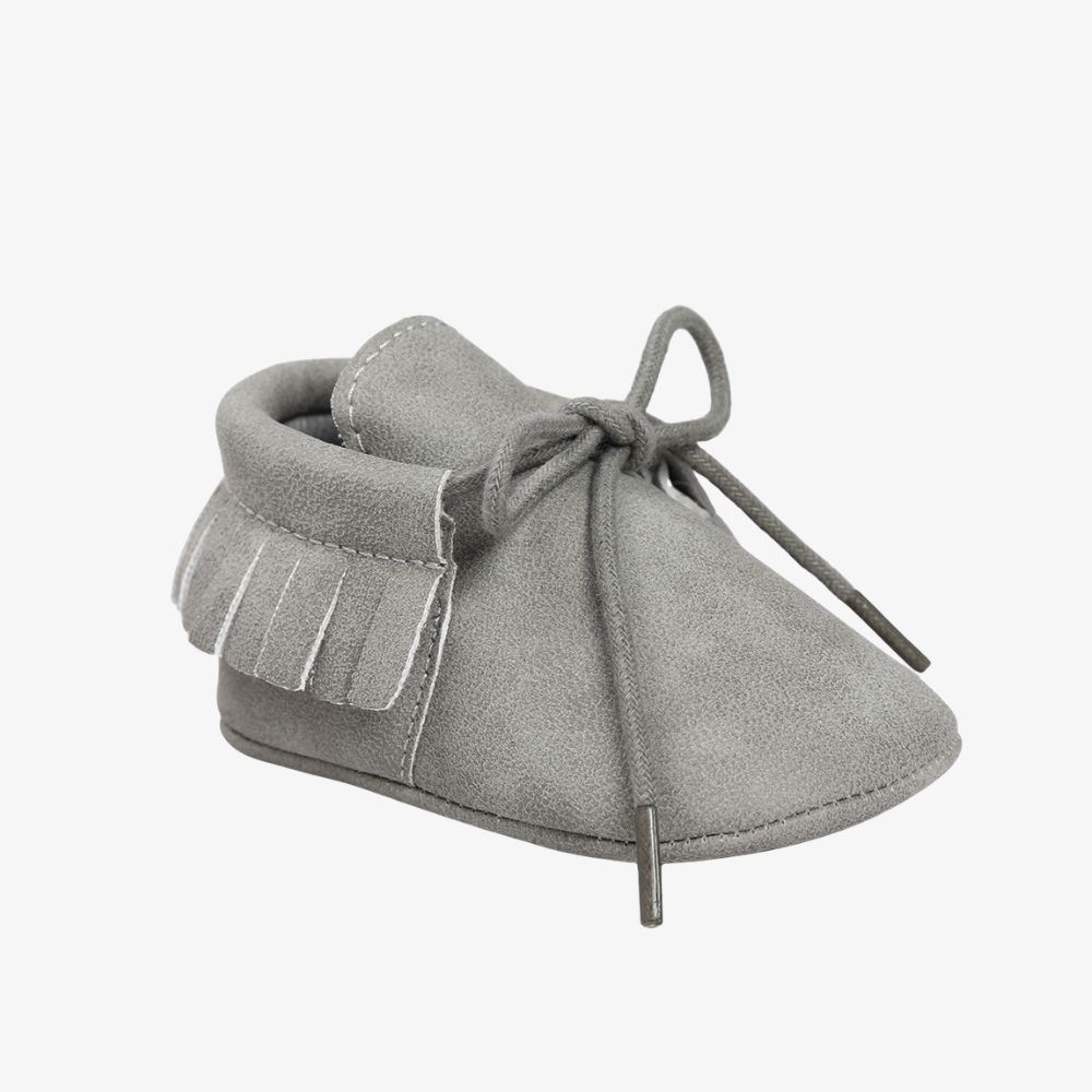 Mocassins à lacets avec des franges pour bébé