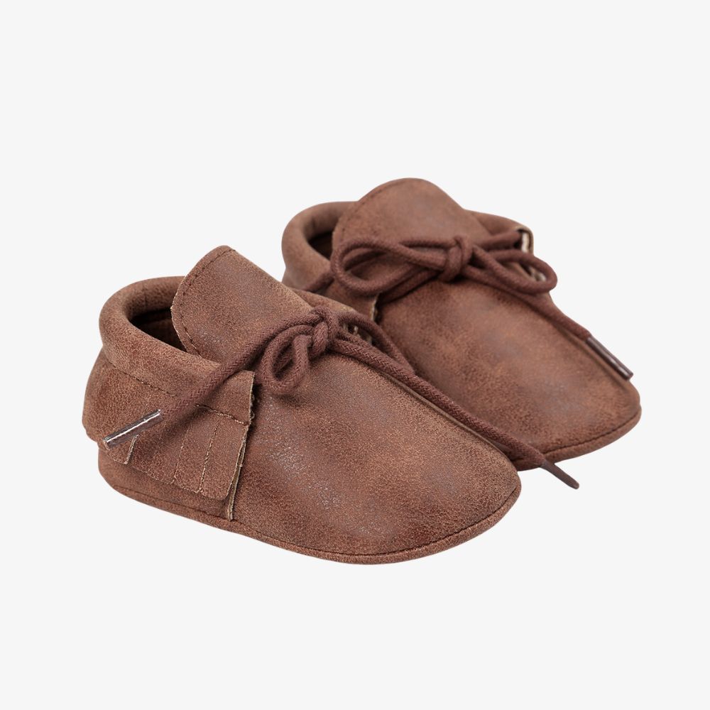 Mocassins à lacets avec des franges pour bébé