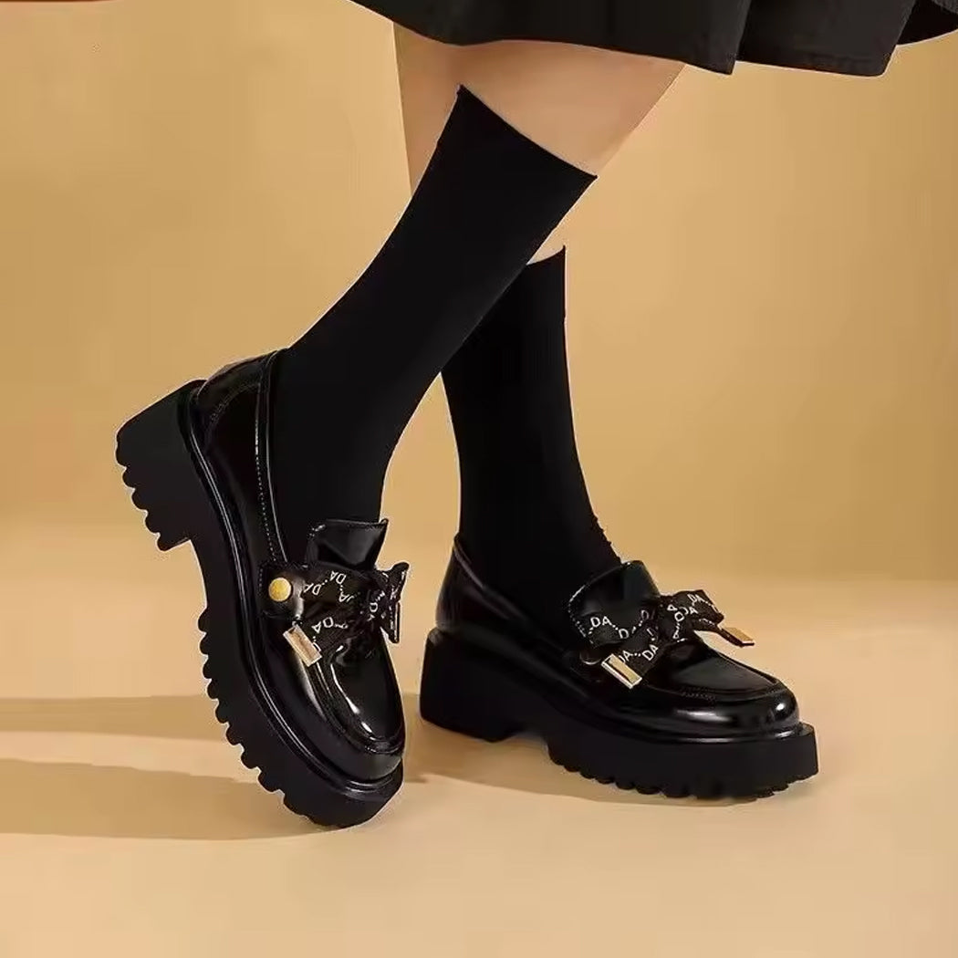 Mocassin plateforme noir à noeud pour femme