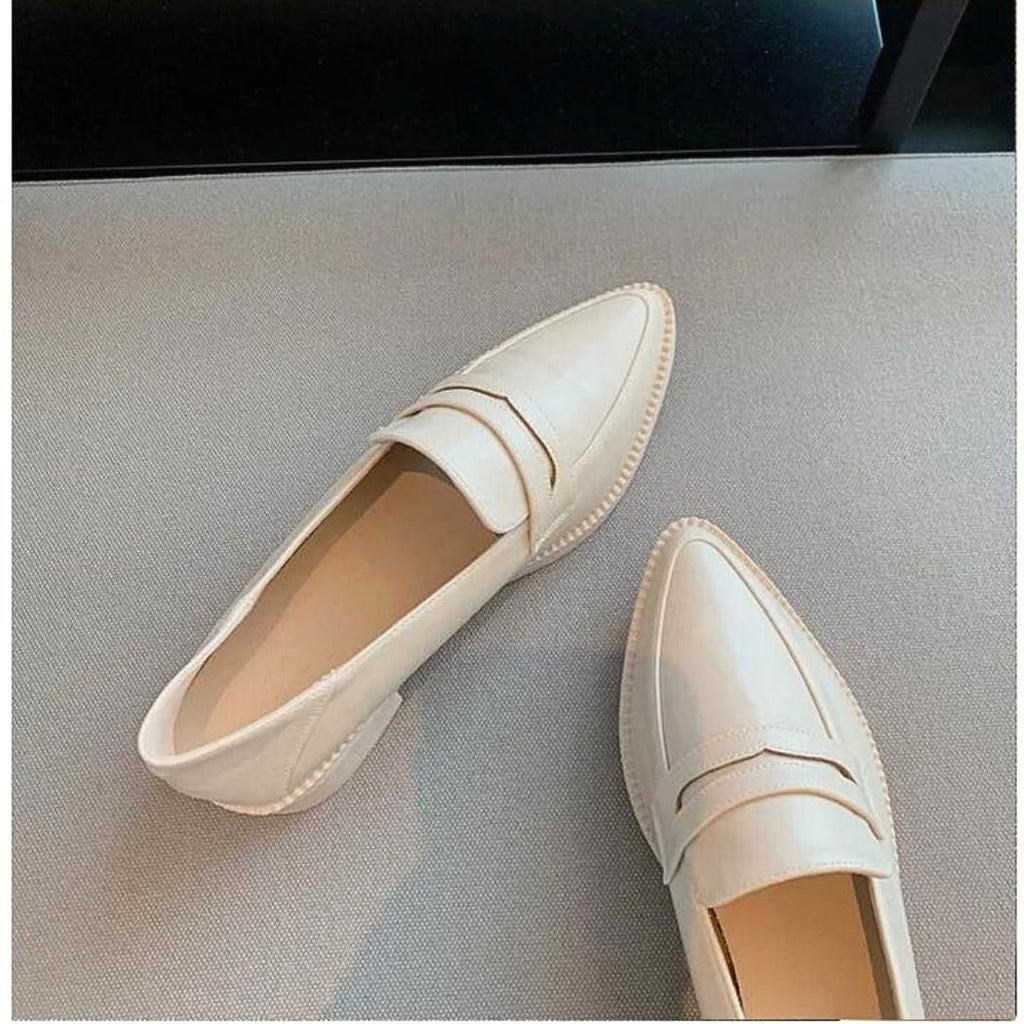 Mocassins à talon carré avec une semelle en simili cuir