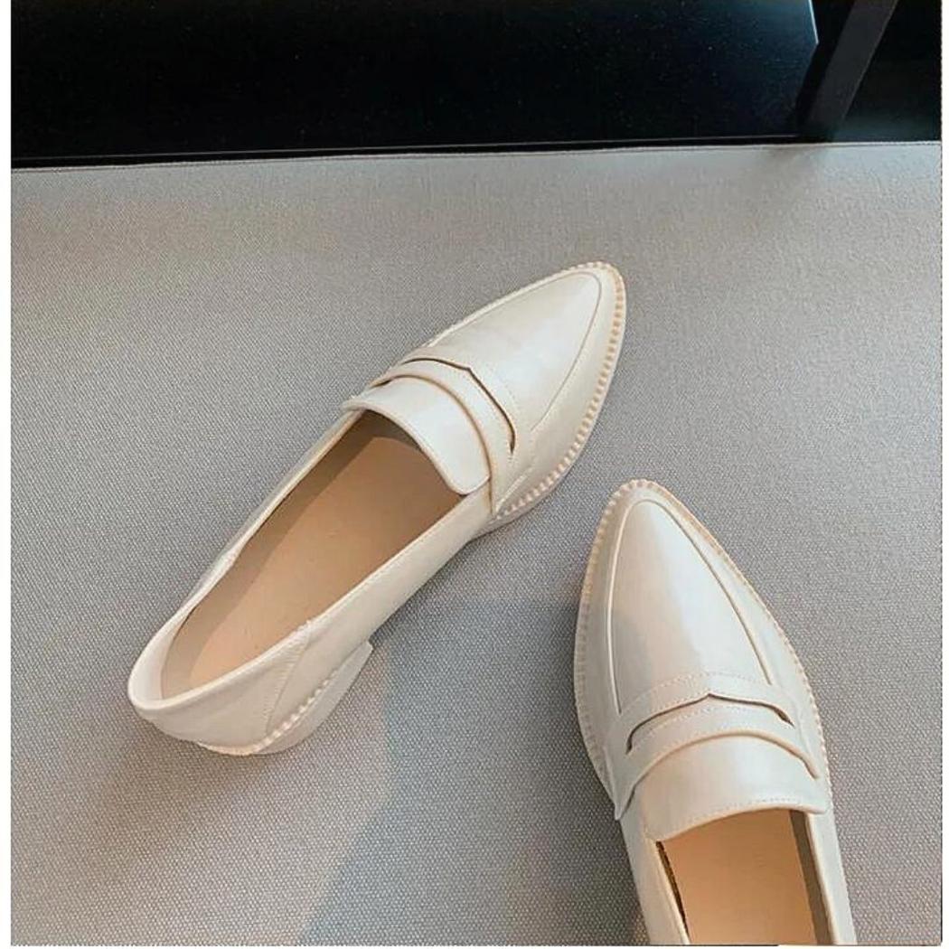Mocassins à talon carré avec une semelle en simili cuir