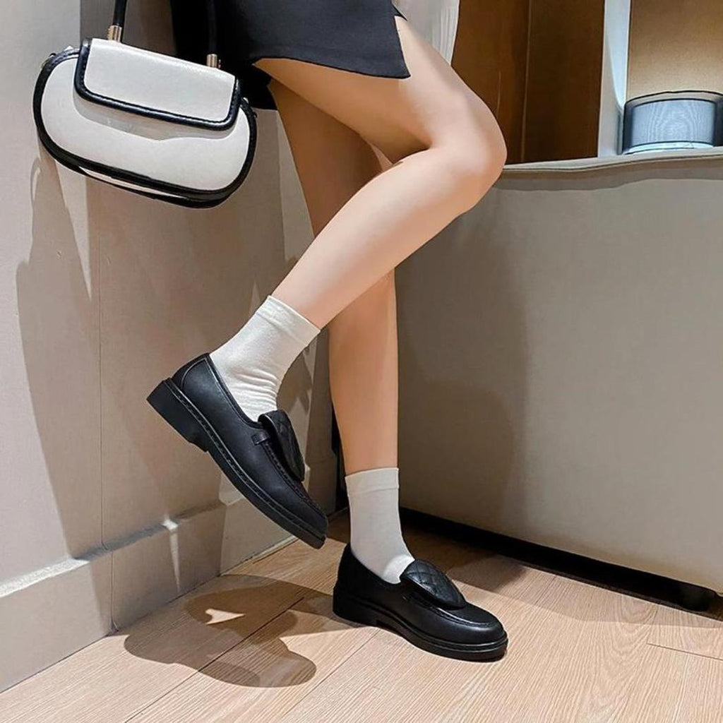 Mocassins avec dessus matelassé à talons carrés pour femme