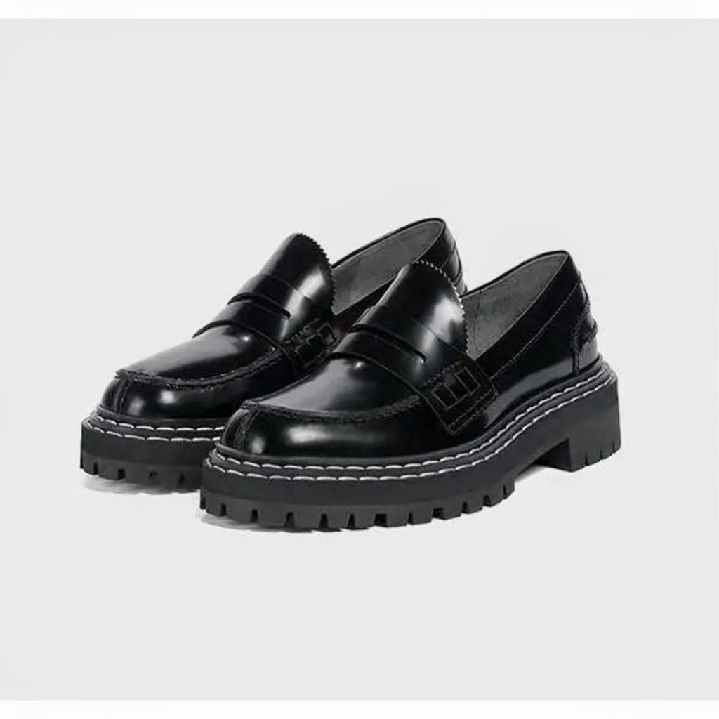 Mocassins noirs avec semelle épaisse pour femme en cuir synthétique