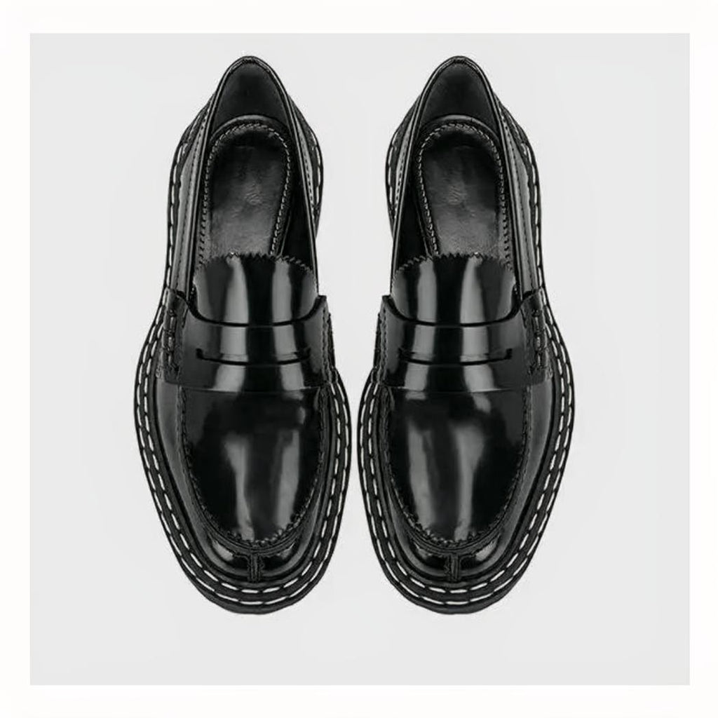 Mocassins noirs avec semelle épaisse pour femme en cuir synthétique