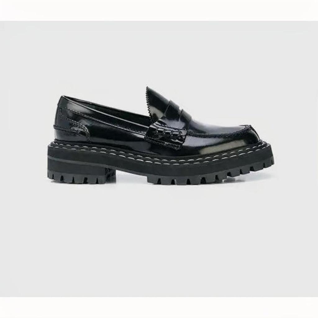 Mocassins noirs avec semelle épaisse pour femme en cuir synthétique