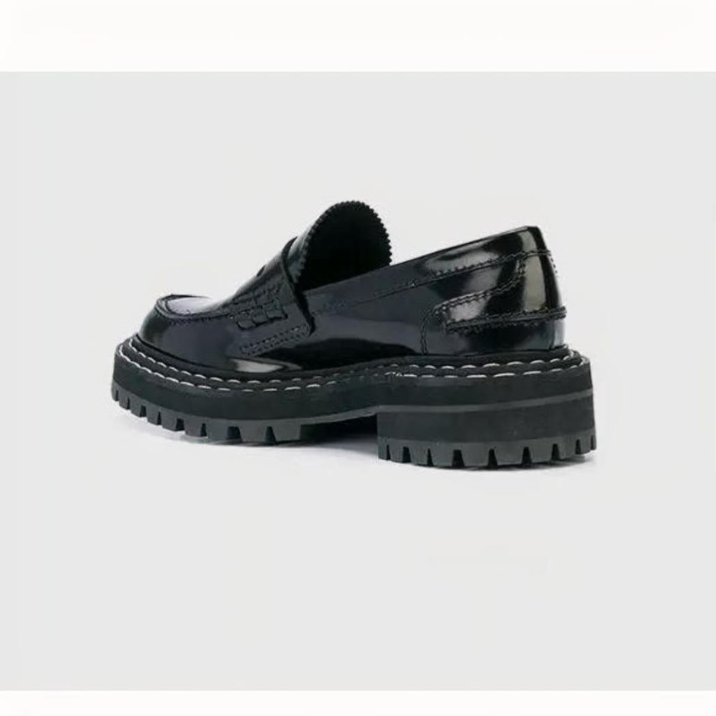 Mocassins noirs avec semelle épaisse pour femme en cuir synthétique