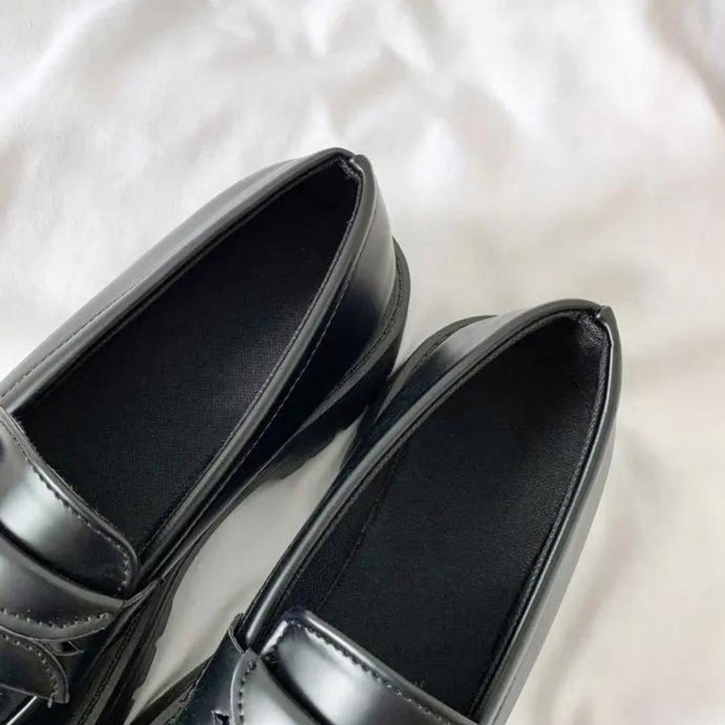 Mocassins noirs à talon carré et semelle épaisse pour femme
