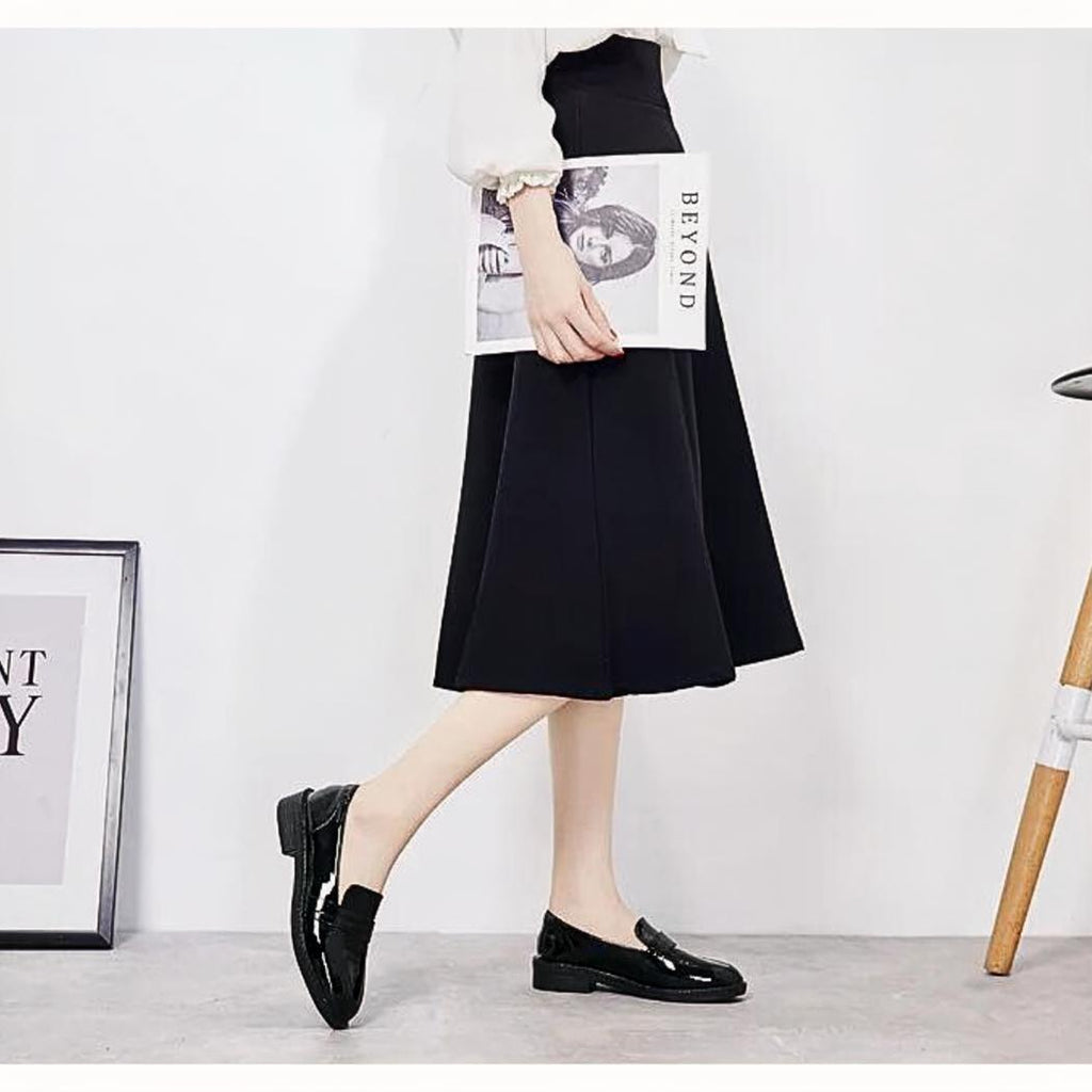 Mocassins noirs à talons carrés pour femme dans le style preppy