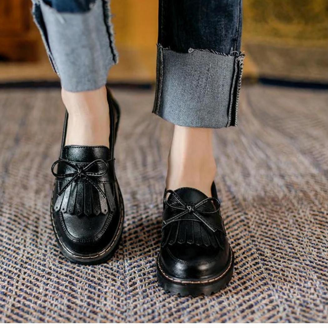 Mocassins à talons carrés avec frange dans le style vintage
