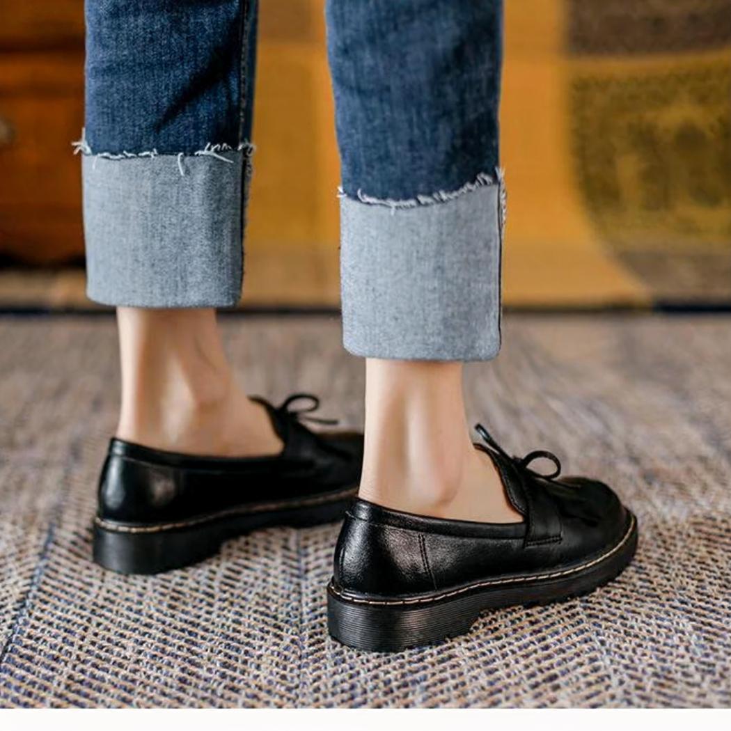 Mocassins à talons carrés avec frange dans le style vintage