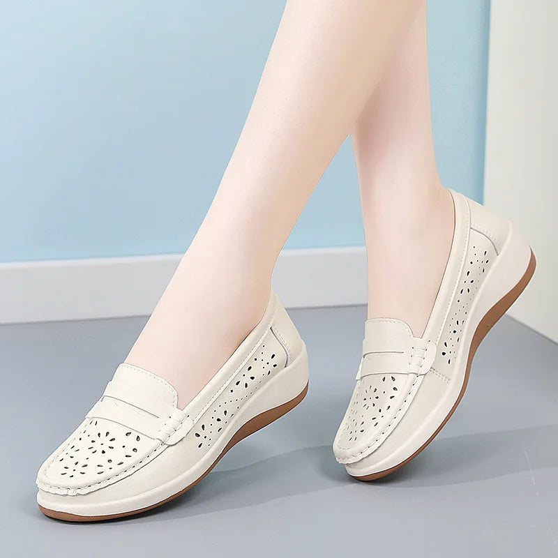 Mocassins compensés ajourés pour femme, coloris Blanc