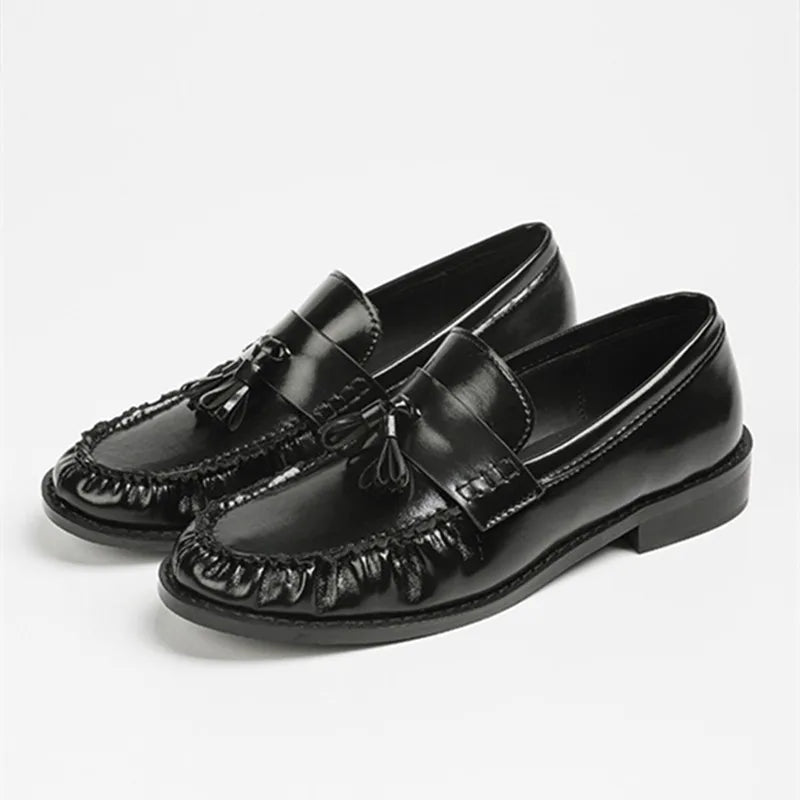 Mocassins à pampille en cuir pour femme, coloris Noir