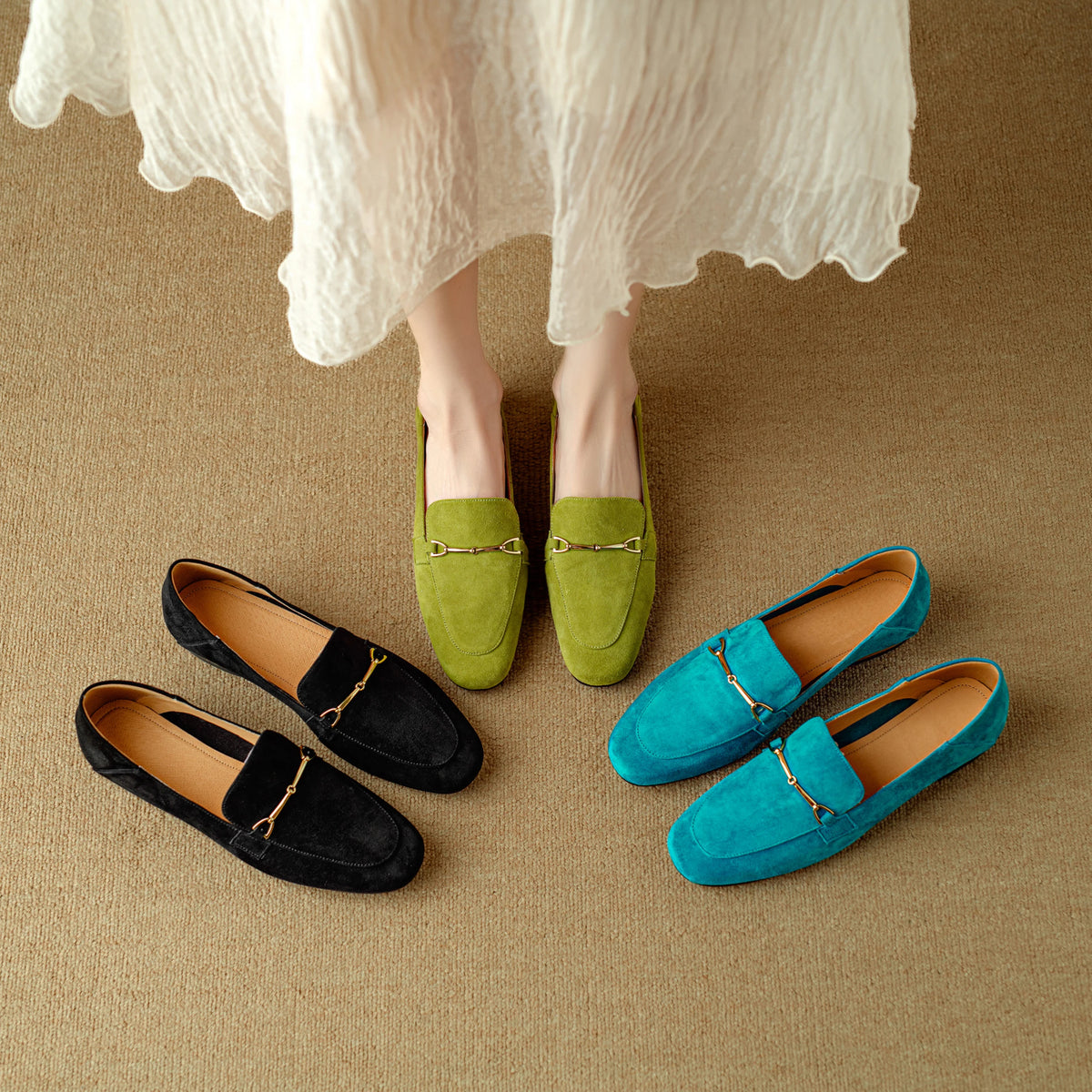 Mocassins en cuir à boucle métallique pour femme