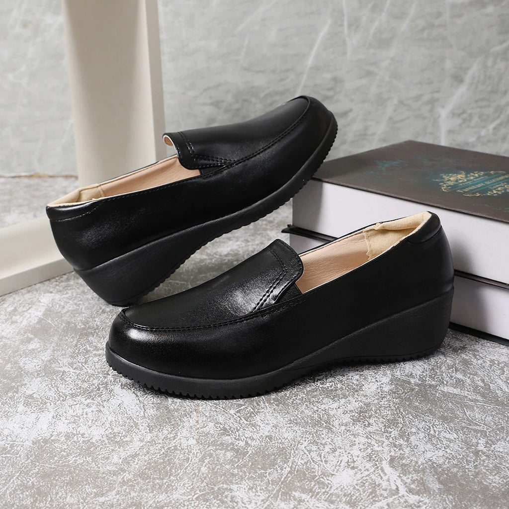 Mocassins compensés noirs pour femme