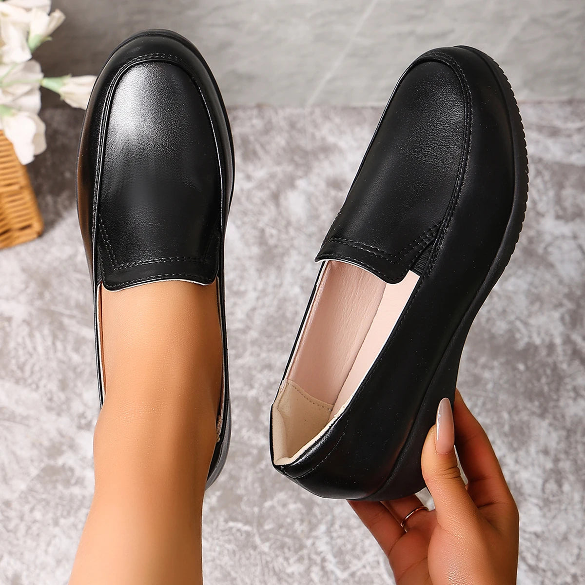 Mocassins compensés noirs pour femme
