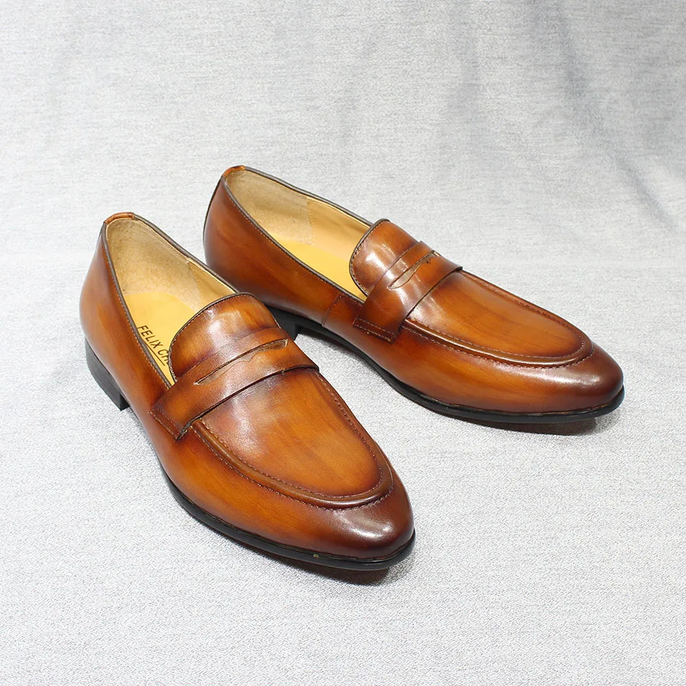 Mocassins penny loafer en cuir patiné pour homme