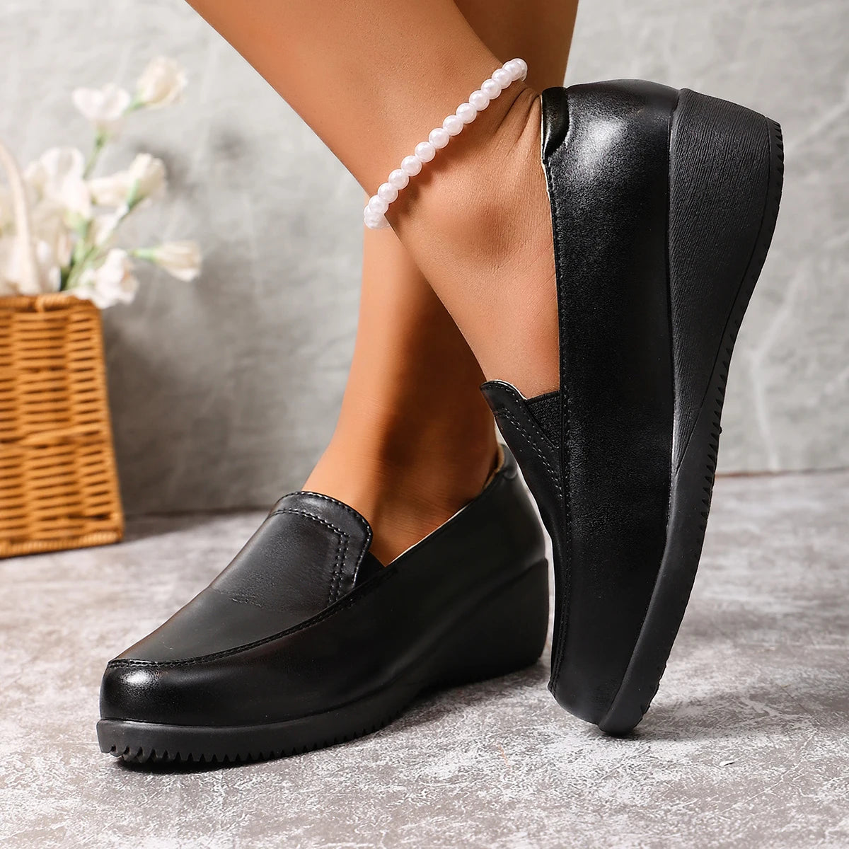 Mocassins compensés noirs pour femme
