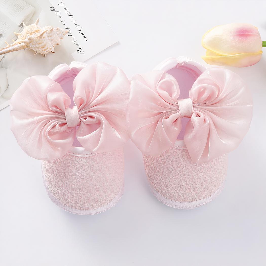 Mocassin avec nœud et semelle souple pour bébé fille