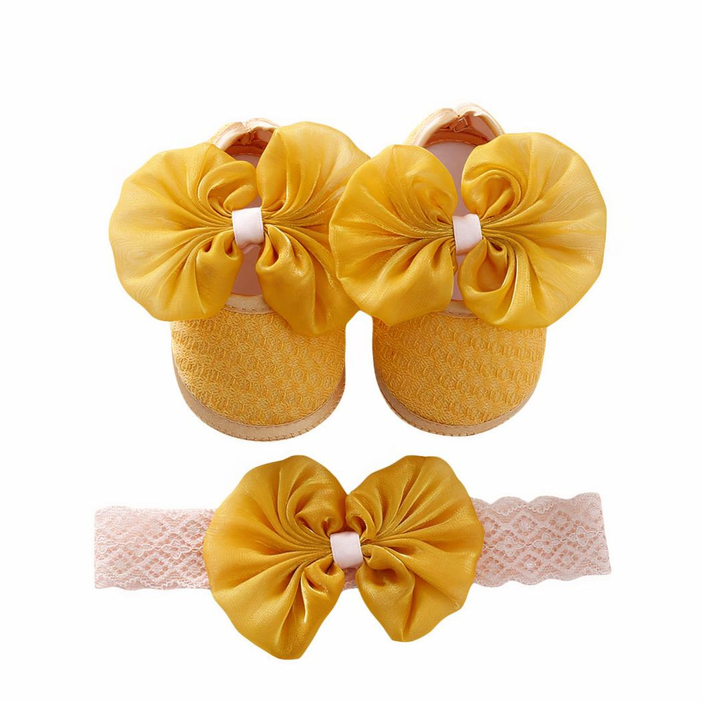 Mocassin avec nœud et semelle souple pour bébé fille