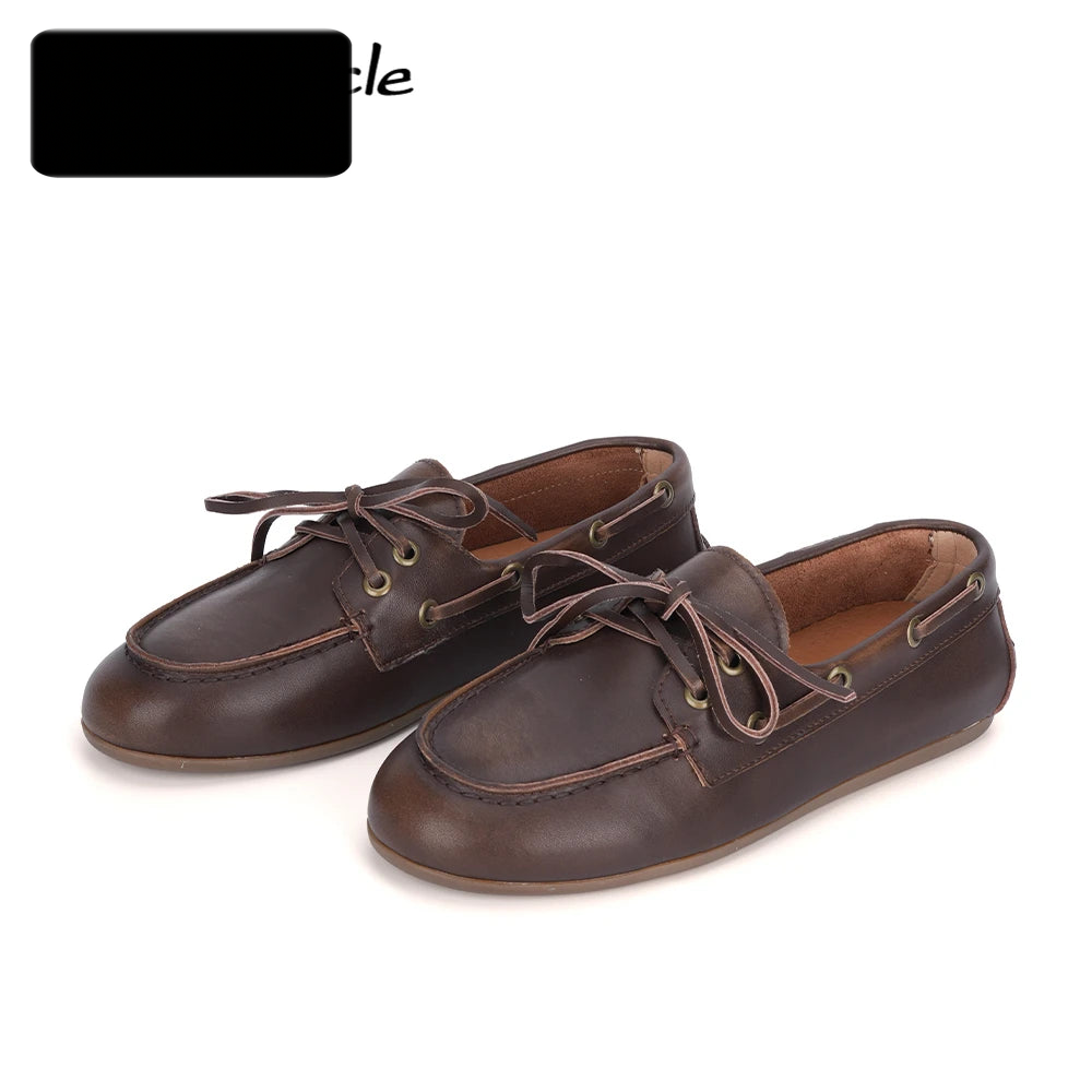 Mocassins bateau à lacets en cuir pour femme