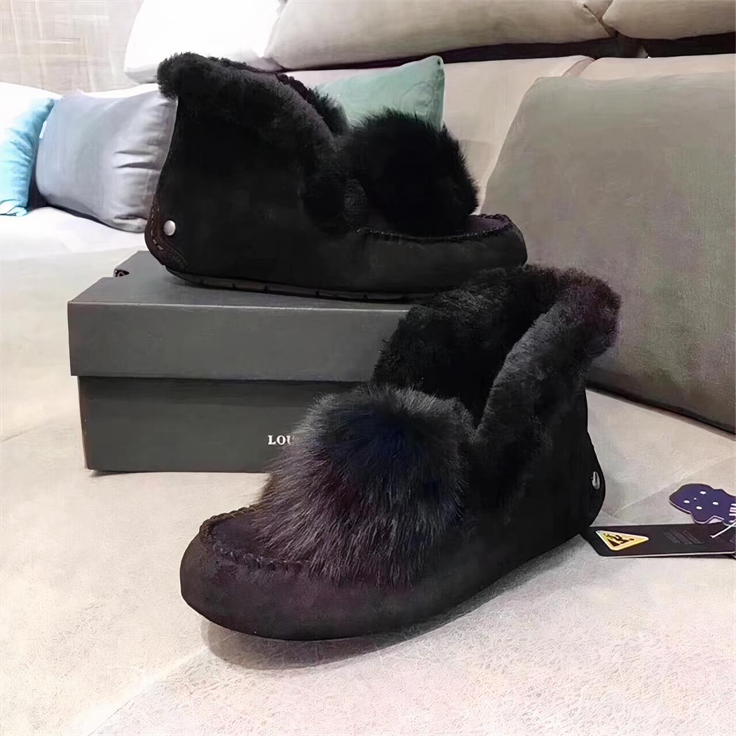 Mocassins indiens en daim fourré à pompon