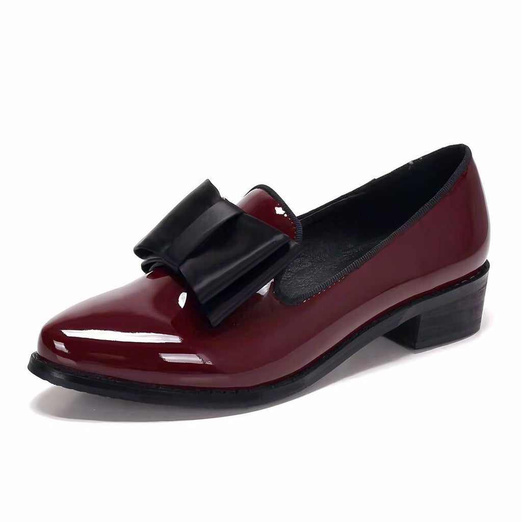 Mocassins à bout pointu en cuir verni avec nœud décoratif