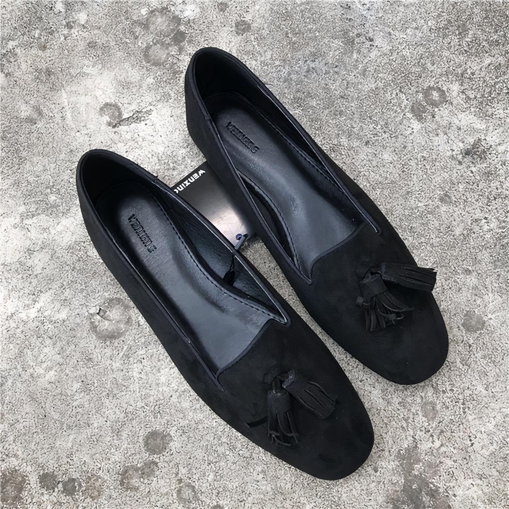 Mocassins à glands noirs effet daim pour femme