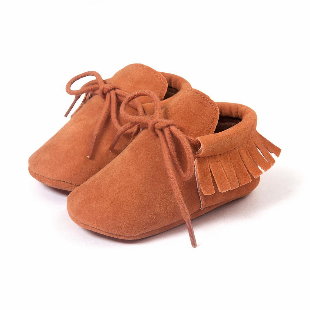 Mocassins à lacets avec des franges pour bébé