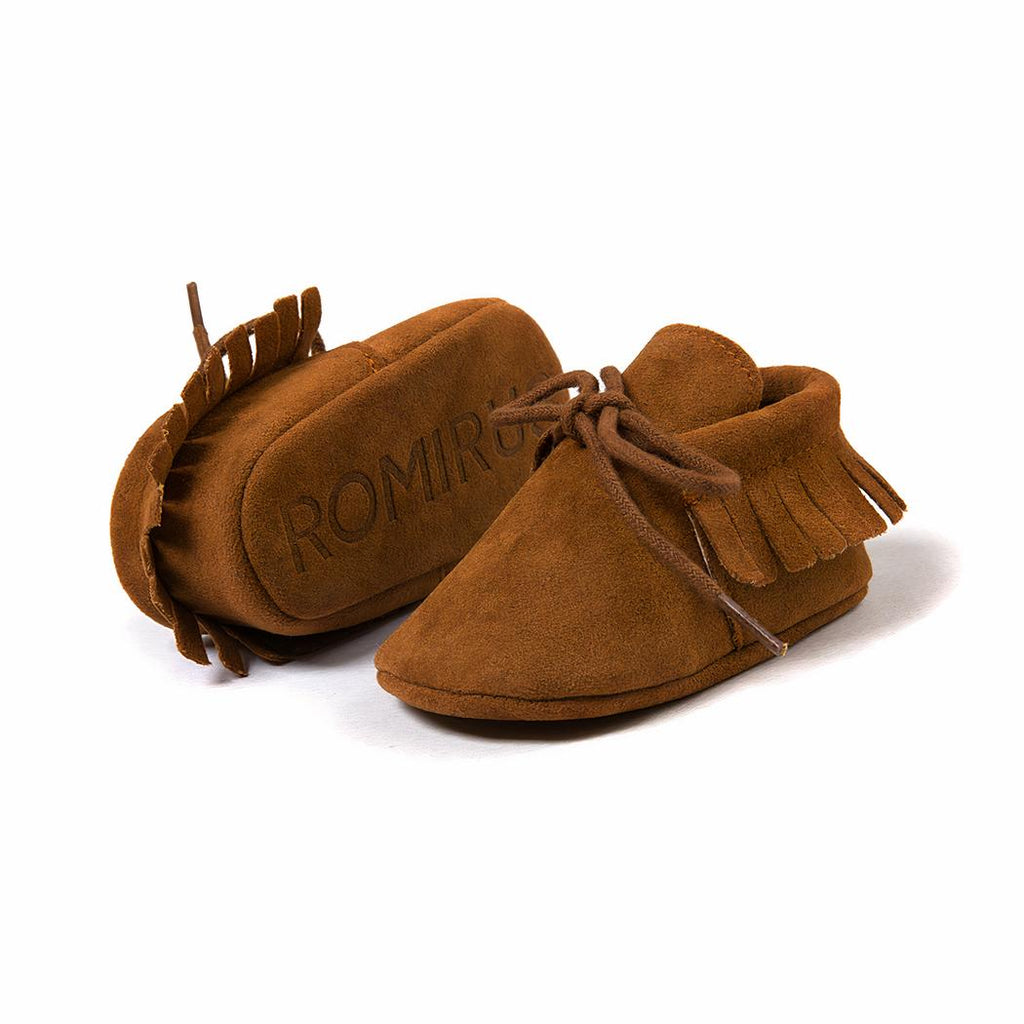 Mocassins à lacets avec des franges pour bébé