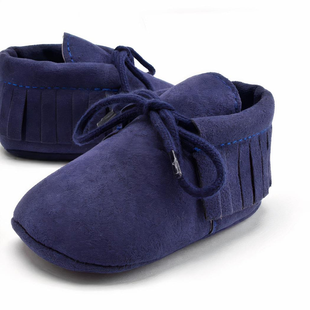 Mocassins à lacets avec des franges pour bébé