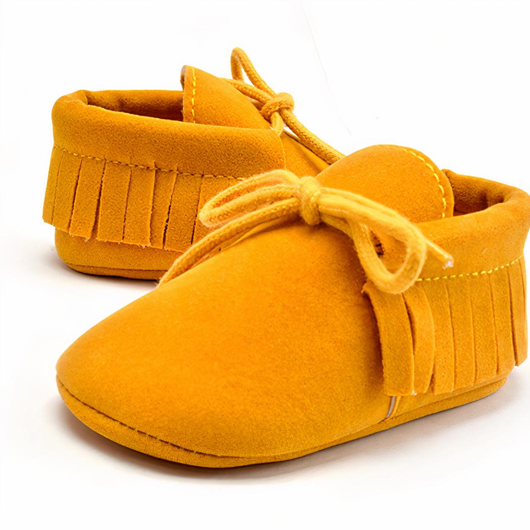 Mocassins à lacets avec des franges pour bébé