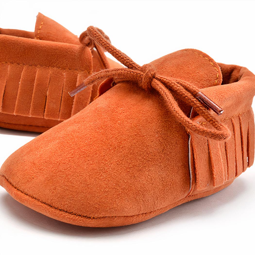Mocassins à lacets avec des franges pour bébé
