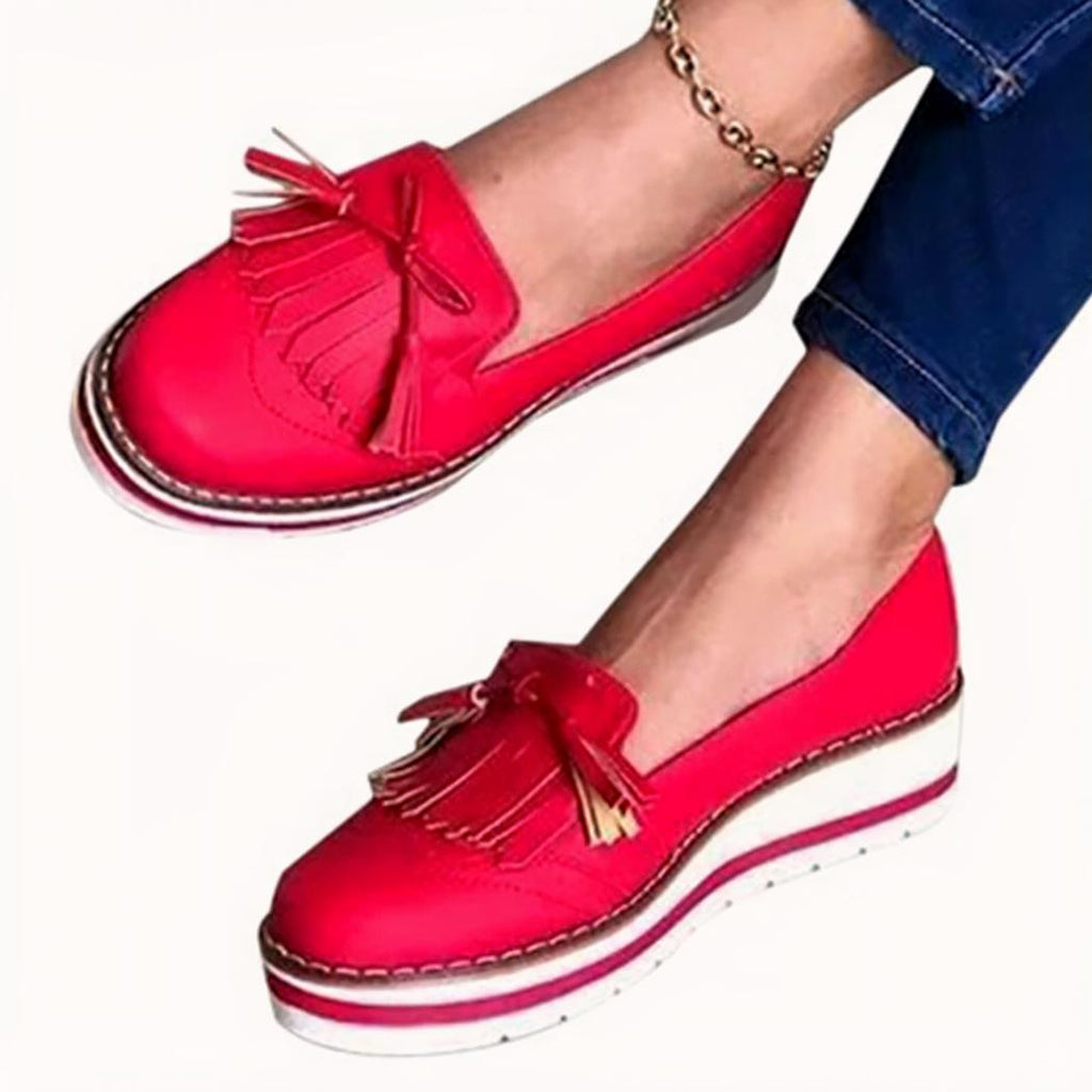 Mocassins à talons compensés à franges pour femme