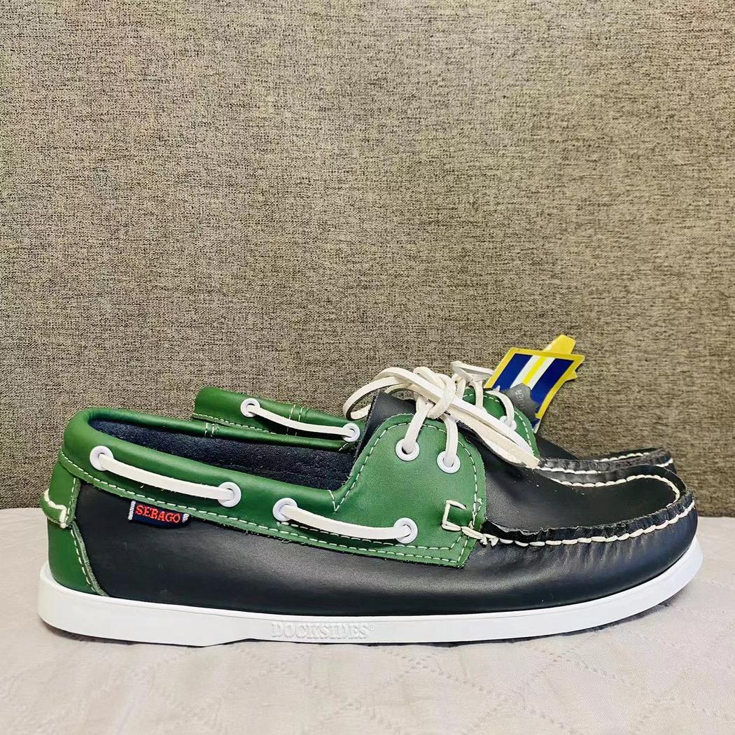 Mocassins bateau noirs bicolores à lacets pour homme