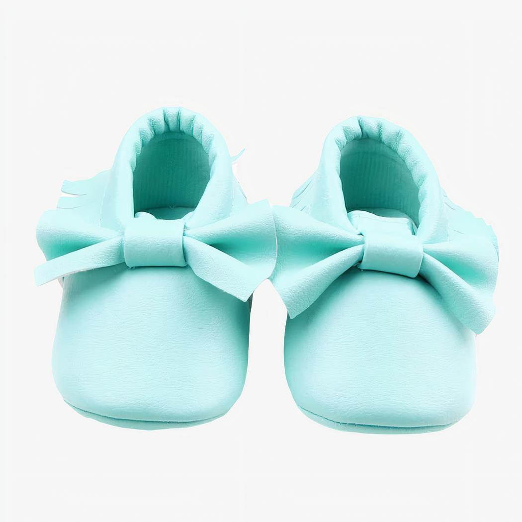 mocassin en coton bleu pour bébé avec un noeud sur le dessus