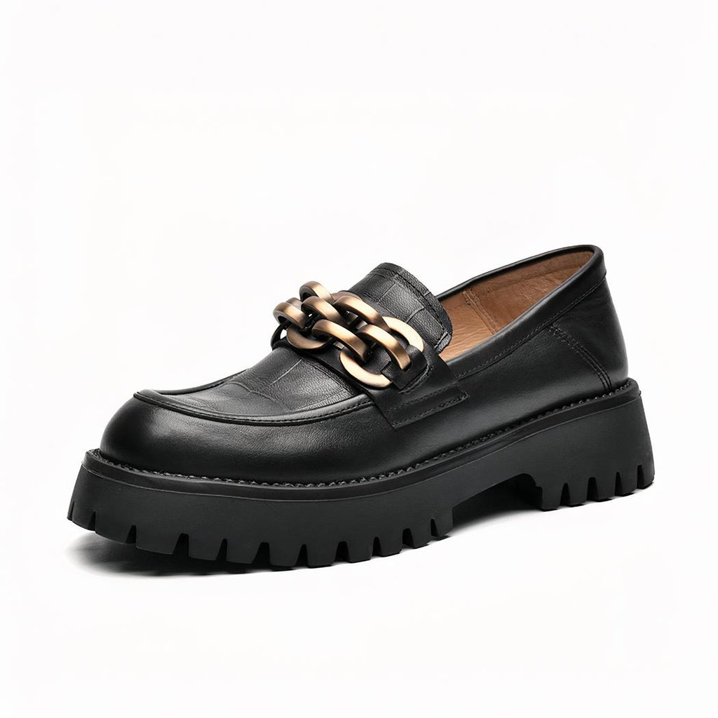 Mocassins en cuir avec une chaîne en métal pour femme