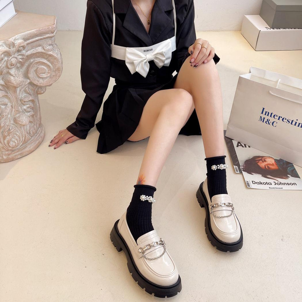 Mocassins en cuir verni à semelle épaisse pour femme
