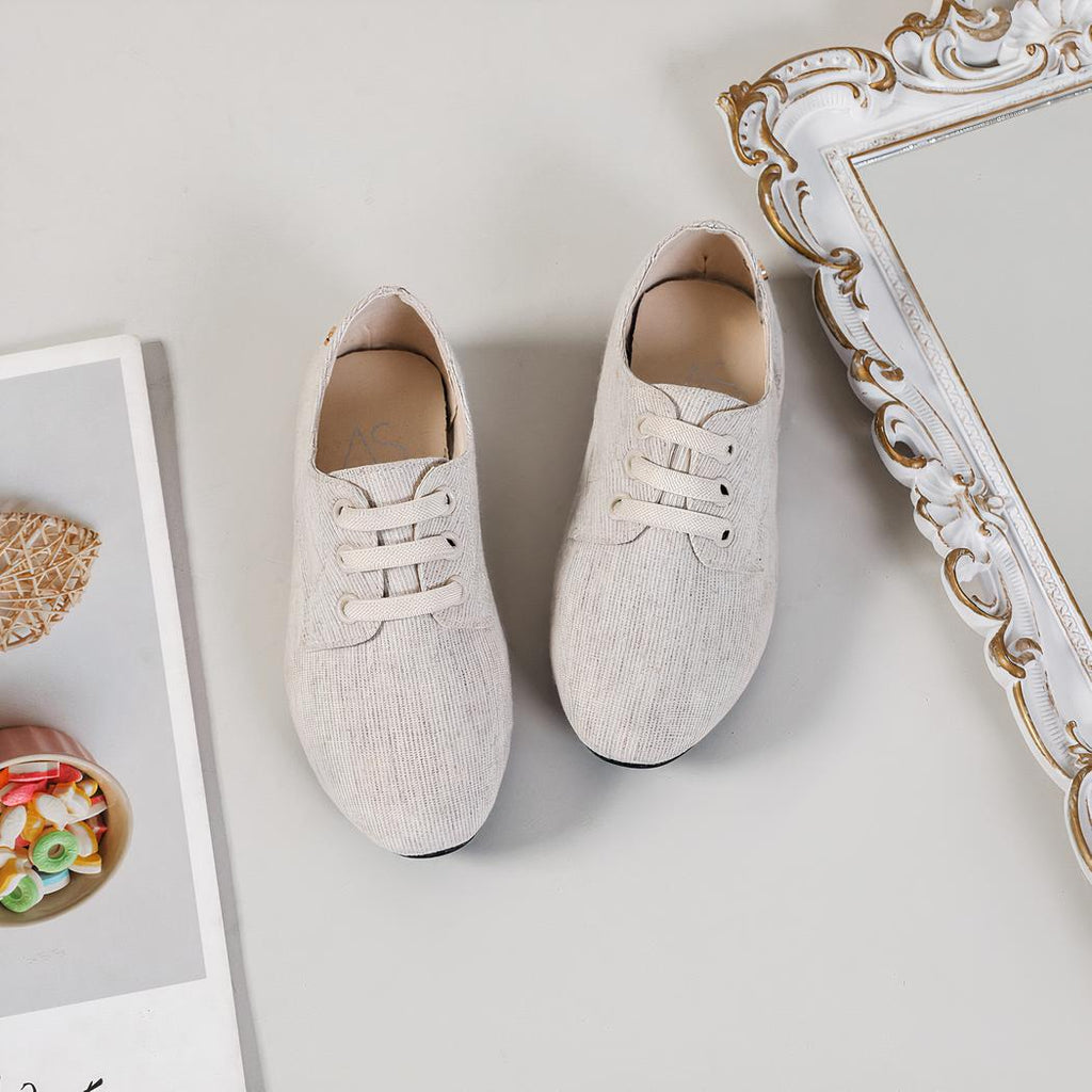 Mocassins en tissu de couleur neutre pour garçons
