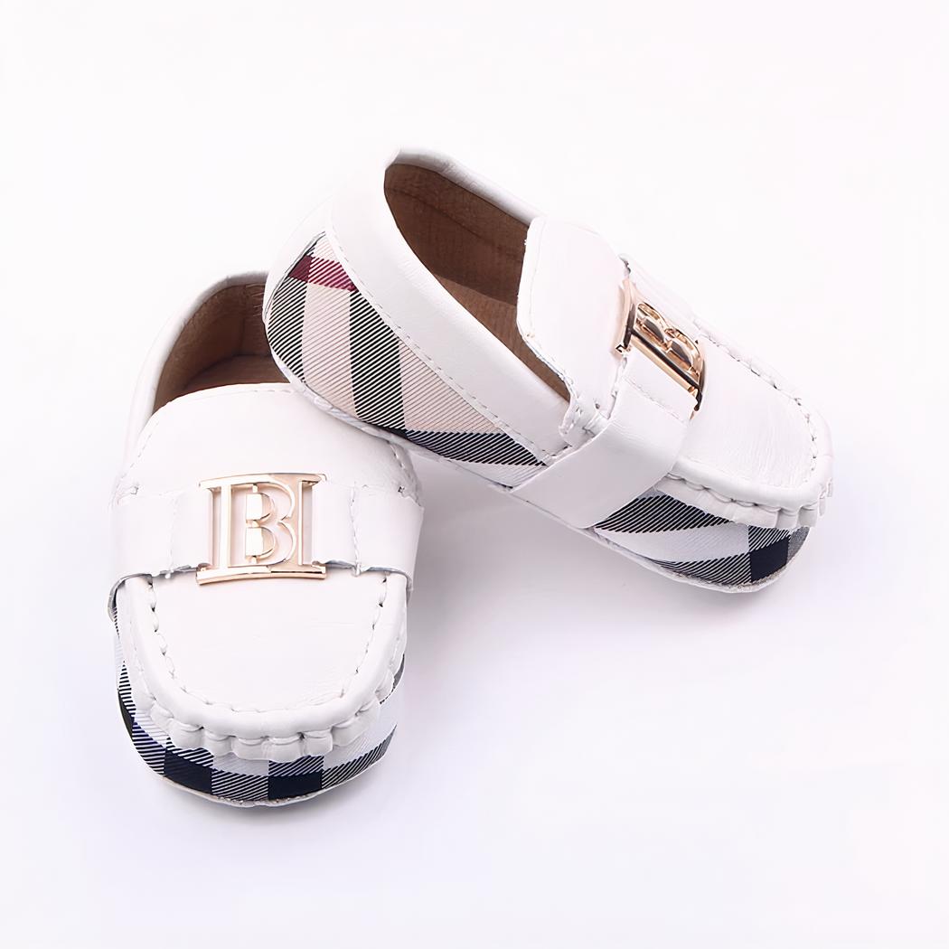 Mocassins habillés souples à carreaux et décoration dorée pour bébé