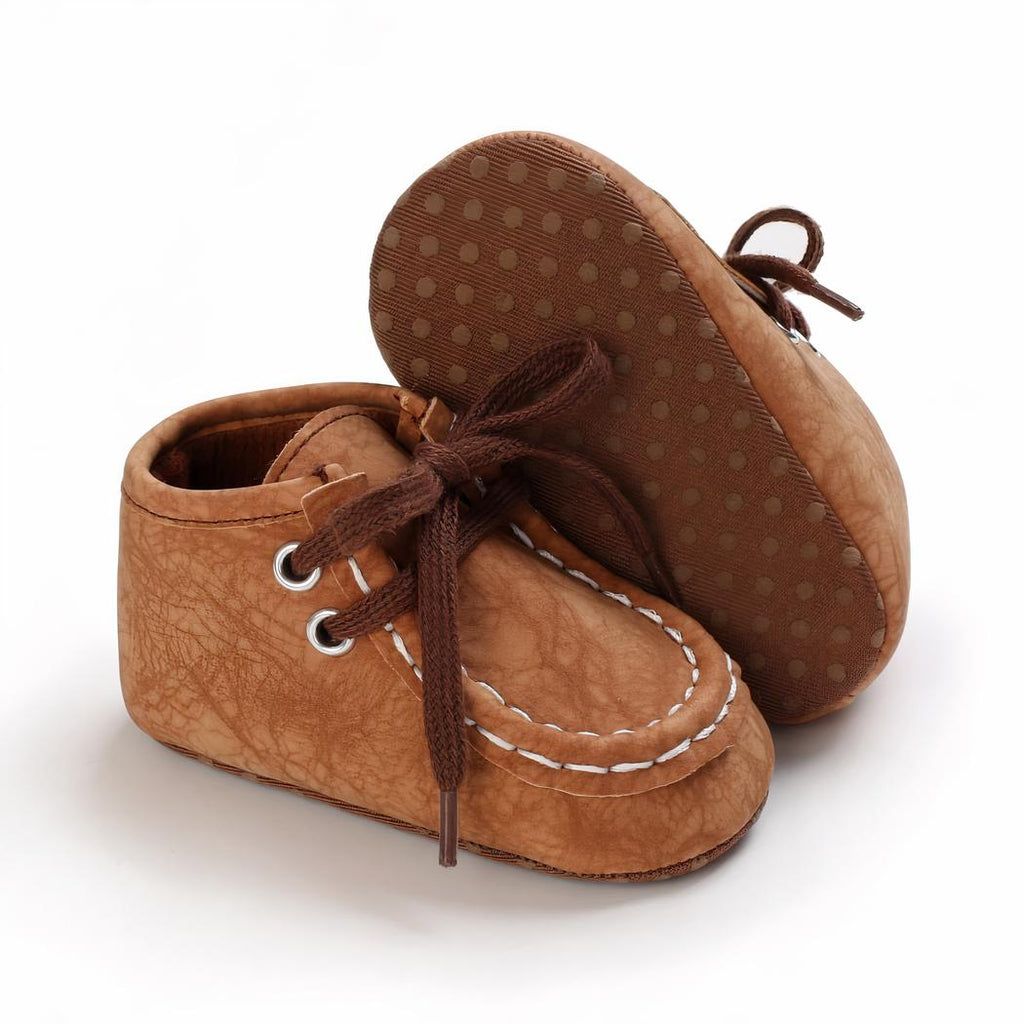Mocassins montants à lacets en matière effet craquelé pour bébé garçon