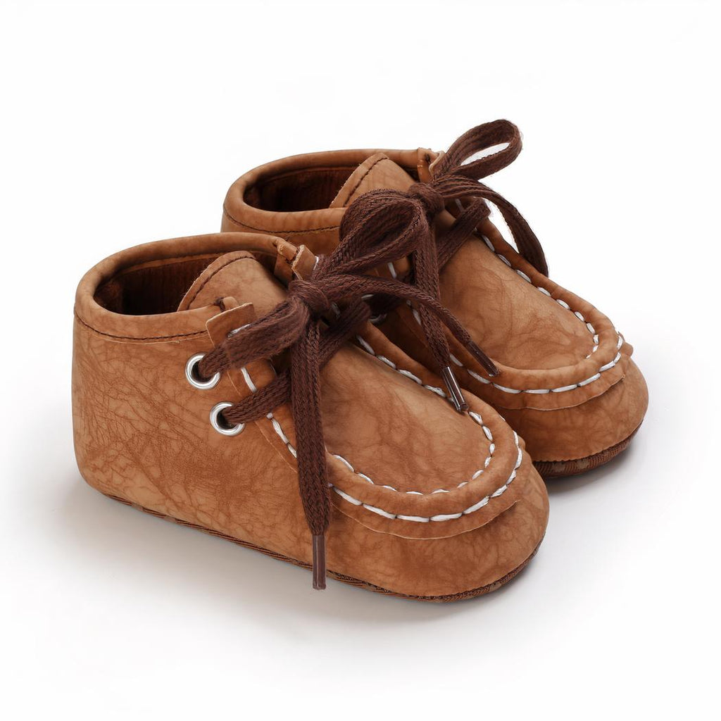 Mocassins montants à lacets en matière effet craquelé pour bébé garçon