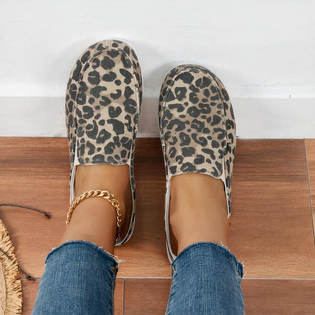 Mocassins mules sport en toile léopard avec semelle épaisse