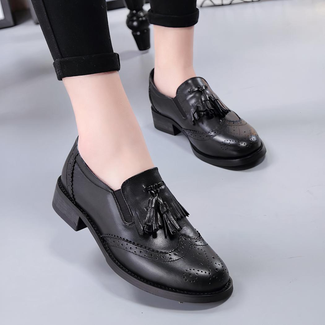 Mocassins noirs à glands à enfiler pour femme